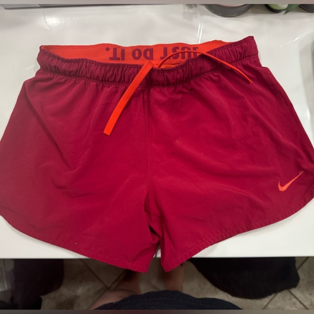 Nike Red Athletic Shorts with Orange Accents